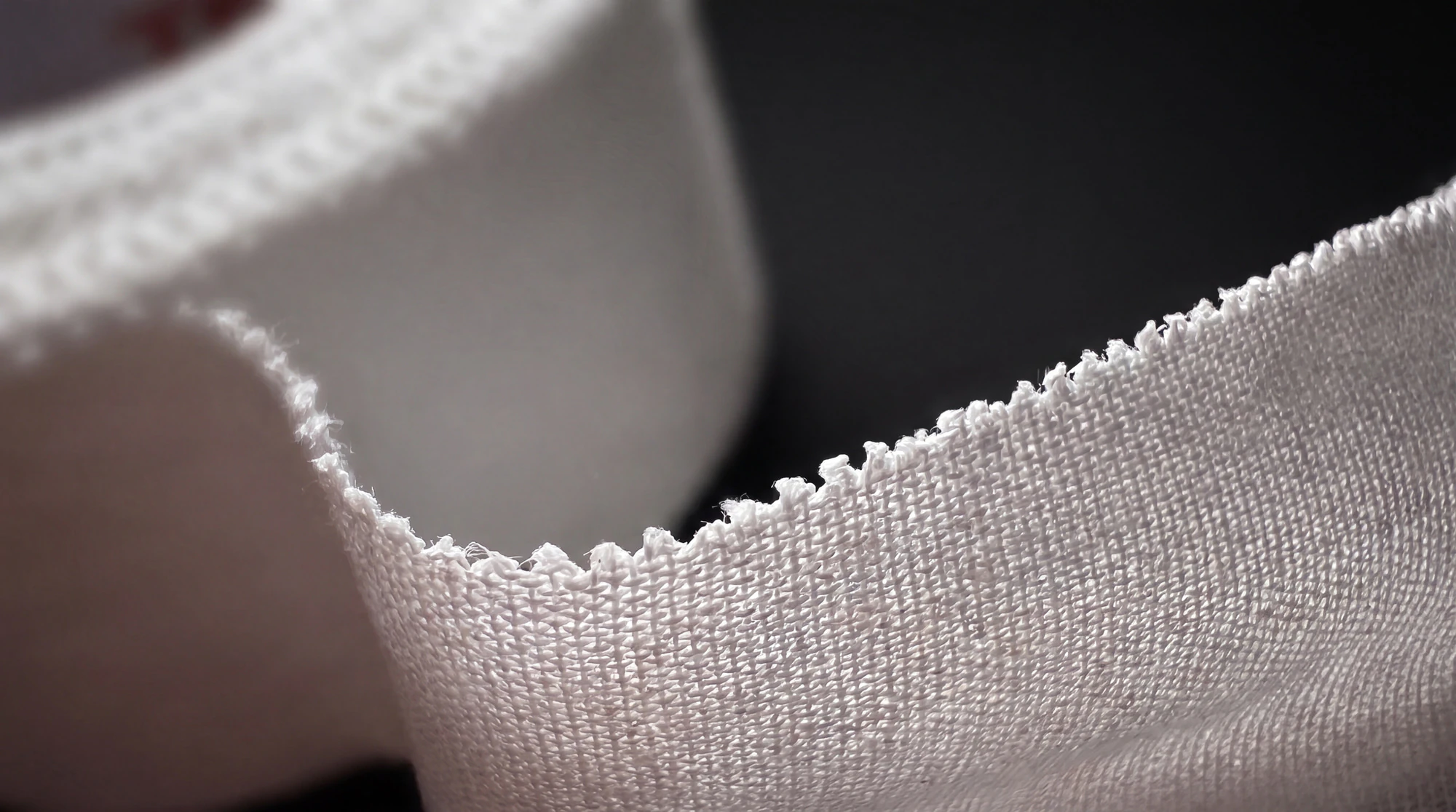 A close look at the cotton weave and the zigzag cut edge of the tape